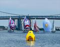 Keelboats racing in the foreground of the scenic Ben Franklin Bridge © Irina Bernatsky