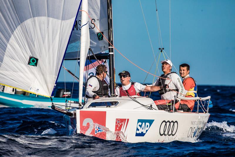 Société Nautique de Genève on day 1 of the Audi SAILING Champions League Final photo copyright SCL / Lars Wehrmann taken at Yacht Club Costa Smeralda and featuring the J70 class