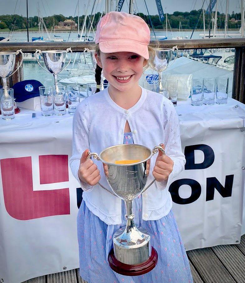 Maisie Richmond with the J70 Land Union Trophy in the Royal Southern YC's Land Union September Regatta 2020 photo copyright Louay Habib / RSrnYC taken at Royal Southern Yacht Club and featuring the J70 class