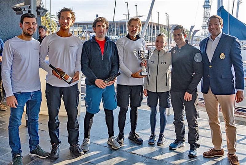`Noticia`, took the second position in the winter series and 5th series. From left to right: Ángel Blazquez (Bodegas Can Marlés), Edu Reguera, Jon Larrazabal, Luis Martín Cabiedes, María Monràs, Alberto Pabrón, and Pablo Garriga as Commodore of the RCNB photo copyright barcelonawinterseries.com taken at  and featuring the J70 class