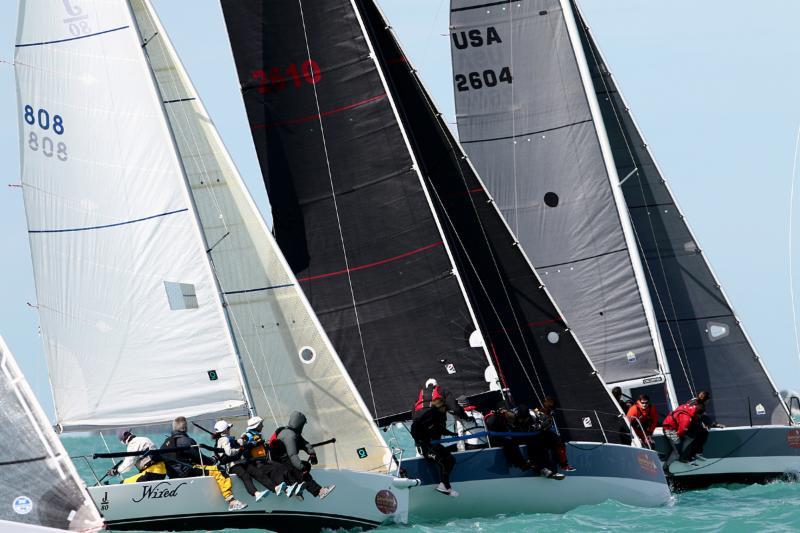 J/80 Wired hanging tough off the start with the GP 26's on day 3 of Quantum Key West Race Week 2016 - photo © Max Ranchi / Quantum Key West