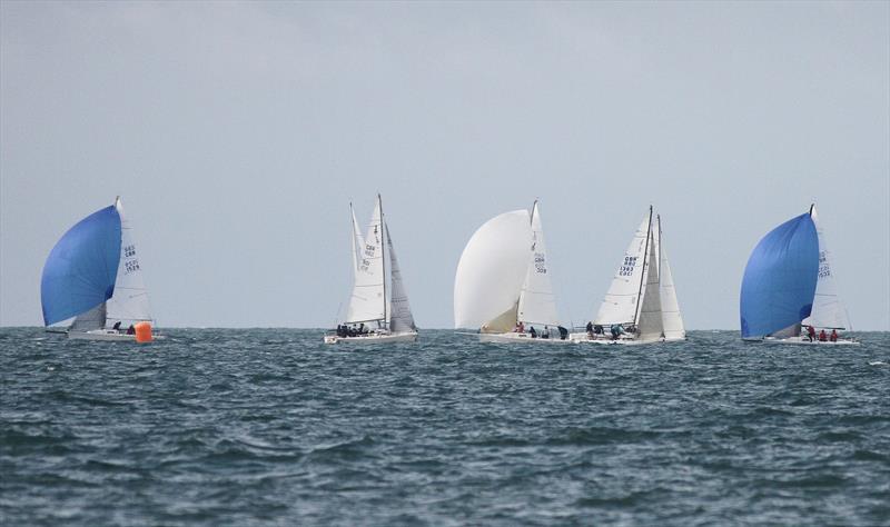 Racing on the final day of the J/80 Nationals in Christchurch Bay photo copyright Mark Jardine / YachtsandYachting.com taken at Royal Lymington Yacht Club and featuring the J80 class