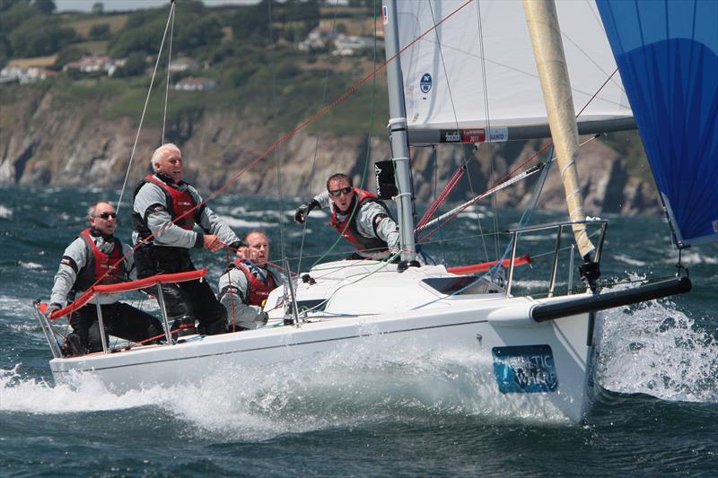 Paul Heys, MD of Key Yachting, working hard on the spinnaker sheet photo copyright Key Yachting taken at  and featuring the J80 class