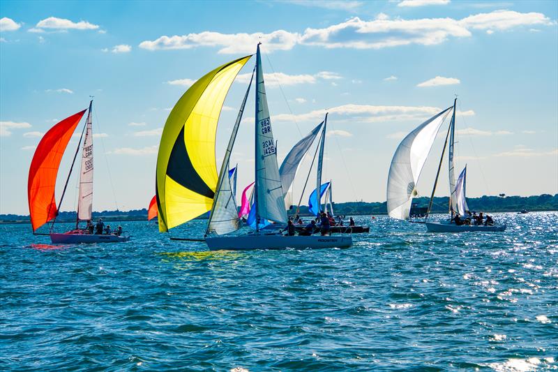 J/80s racing on the Solent at RLymYC's popular Thursday Night Racing series photo copyright Paul French taken at Royal Lymington Yacht Club and featuring the J80 class