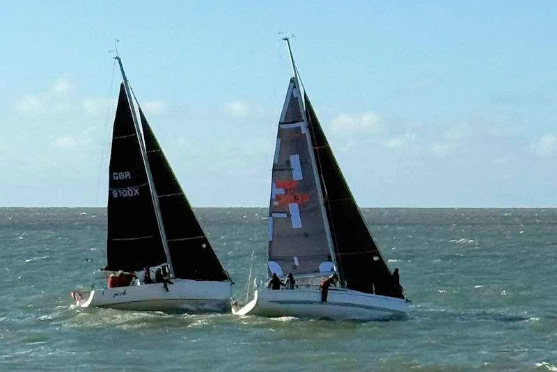 Mark Thompson's J97 Jac y Dô and Nigel Ingram's XP33 Darling xx approaching the start line for the coastal race - Easter 2026 at Pwllheli photo copyright Michelle Jones taken at Pwllheli Sailing Club and featuring the J/97 class
