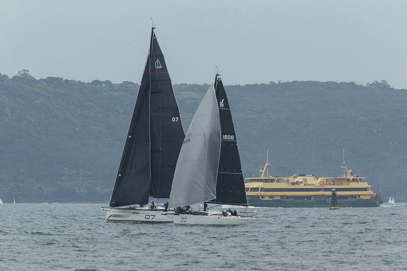 J/99 Rum Rebellion neck and neck at the finish with a 46ftr - Bird Island Race photo copyright Cruising Yacht Club of Australia taken at Cruising Yacht Club of Australia and featuring the J/99 class