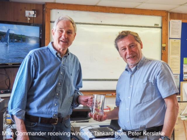 Mike Commander receiving the winner's tankard from Peter Kerslake after the K1 Travellers Open at Teign Corinthian photo copyright Garnett Showell taken at Teign Corinthian Yacht Club and featuring the K1 class