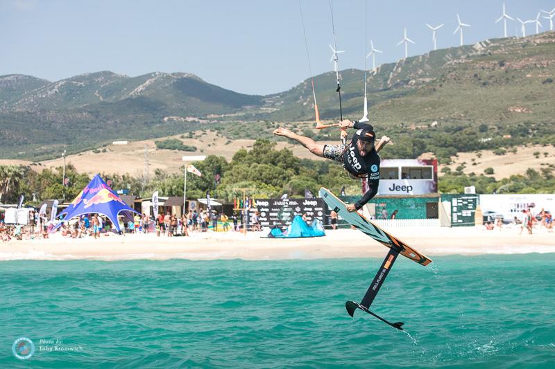 Don't worry, this is Tarifa! There was still enough Poniente wind to get wet with some form of shred! Javier Fernandez flinging the foil!  - photo © Toby Bromwich