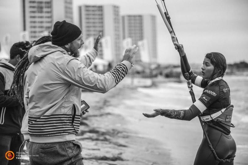 It's more than a solo effort to become World Champion at just 13… though raw talent is of course the primary ingredient. Coach Fabio and Mika's dad supporting from the sidelines - photo © Ydwer van der Heide