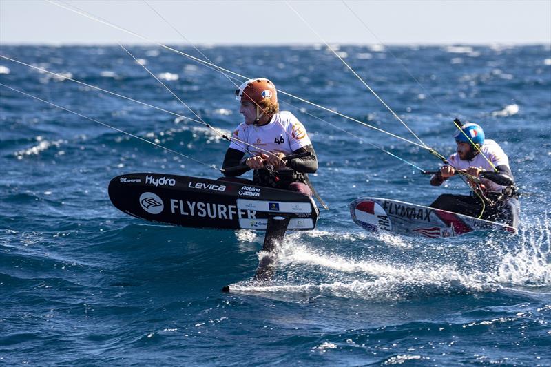 Theo de Ramecourt (FRA) (left)  following Maxime Nocher (FRA) (right)  around the right hand-bottom mark close enough to see the hairs raised on the back of Maxime's neck - 2020 Gran Canaria KiteFoil Open European Championships - photo © IKA Media / Alex Schwarz