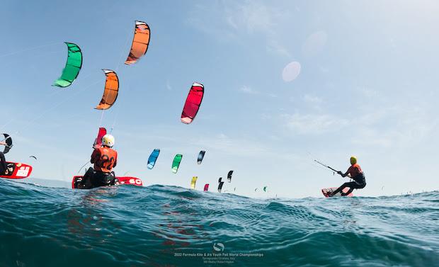 Making waves in the Youth Foil U17 class on Day 4 in Torregrande - IKA Kitefoiling Youth Worlds Torregrande 2022 photo copyright Robert Hajduk / IKA media taken at  and featuring the Kiteboarding class