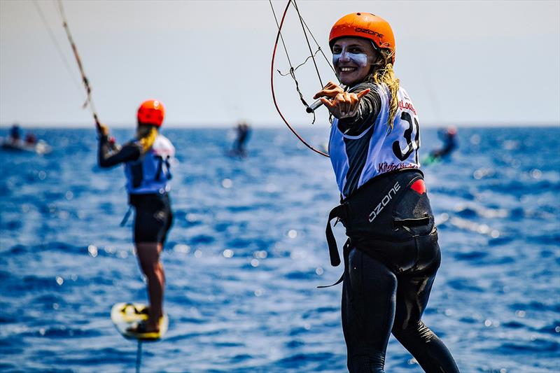 Poema Newland - grinning when she's winning - 2022 KiteFoil World Series Gizzeria photo copyright Martina Orsini / IKA taken at  and featuring the Kiteboarding class