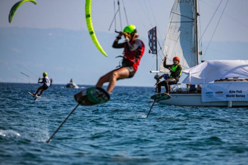 Ellie Aldridge leads Poema Newland across the finish - 2022 KiteFoil World Series Gizzeria day 2 photo copyright IKA Media / Martina Orsini taken at  and featuring the Kiteboarding class