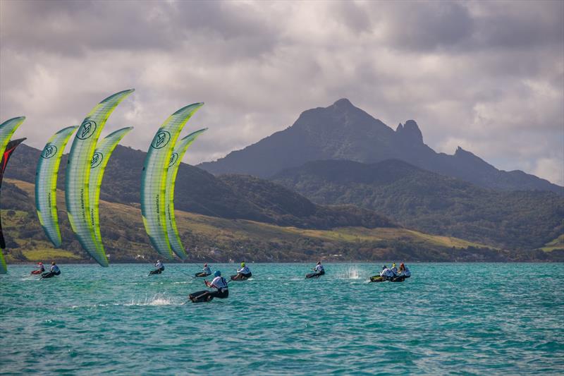 Black volcanic rocky volumes, sugarcane plantations and rainforest made a dramatic landscape photo copyright IKA Media taken at  and featuring the Kiteboarding class