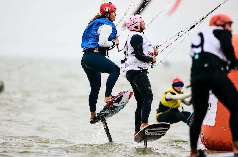 Lauriane Nolot (blue bib) struggled her way around the course - 2023 KiteFoil World Series Final in Zhuhai, Day 3 photo copyright IKA Media / Robert Hajduk taken at  and featuring the Kiteboarding class