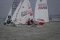 Harry Newton (202316) leads the way out of the first mark melee, Lee Windridge (193245) leads the chase during the KSSA Mid-Summer Regatta at Medway