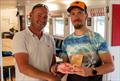 Tom Vessey receives the 2nd Laser Fleet trophy from Vice Commodore Roo Jarvis - Solo and Laser Open Meeting at Middle Nene © David Livingstone