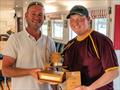 Winner Daniel Wigmore receives the First Laser Fleet and the MNSC Laser trophy from Vice Commodore Roo Jarvis - Solo and Laser Open Meeting at Middle Nene © David Livingstone