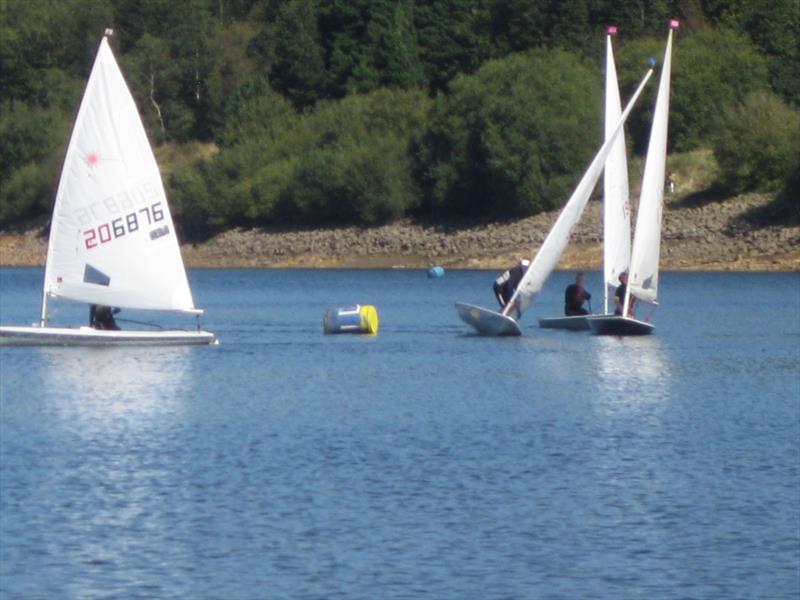 Lasers and Streakers at Scammonden Water photo copyright Paul Cornish taken at Scammonden Water Sailing Club and featuring the ILCA 7 class