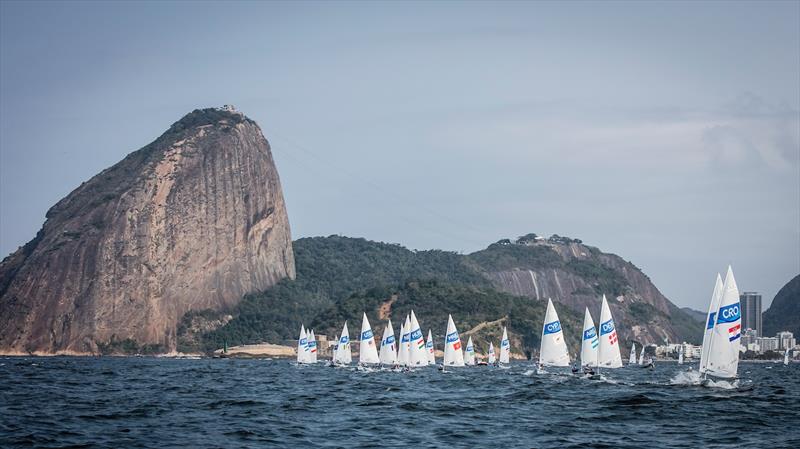 The Laser fleet downwind on Day 1 of the Rio 2016 Olympic Sailing Regatta photo copyright Sailing Energy / World Sailing taken at  and featuring the ILCA 7 class
