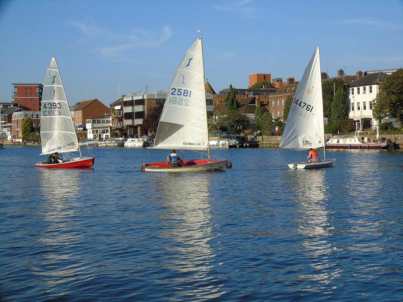 In the New Members race Pat Dobson's Laser leads John Knight (Solo) and eventual winner Micky Kloihofer round the windward mark as the wind dies on the first day of the Minima Regatta 2018 - photo © Rob Mayley