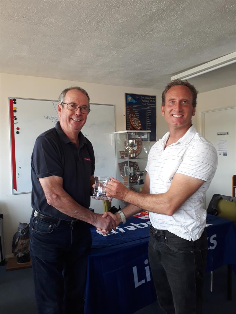 Mervyn Clark congratulates Laser Standard fleet winner Jon Emmett during the Sutton Bingham Laser GP - photo © Saffron Gallagher
