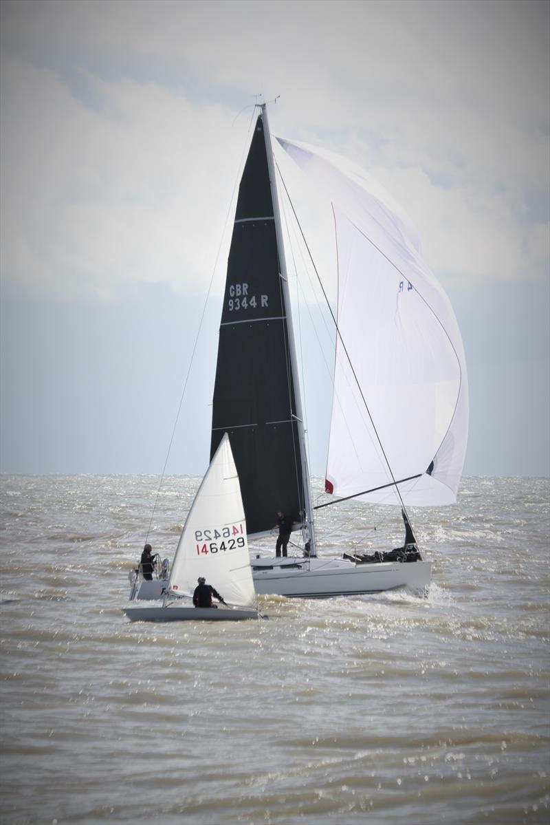 John Evans (146429) sails upwind while Mike & Jo Brand's ‘Foxy' (9344) heads to the finish line to win the yacht race during the Dyson Dash photo copyright Adrian Trice taken at Broadstairs Sailing Club and featuring the ILCA 7 class