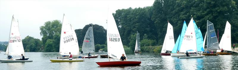 Merlins and Enterprises head upstream as the Lasers and Solos prepare for their start at the Minima Regatta photo copyright Rob Mayley taken at Minima Yacht Club and featuring the ILCA 7 class