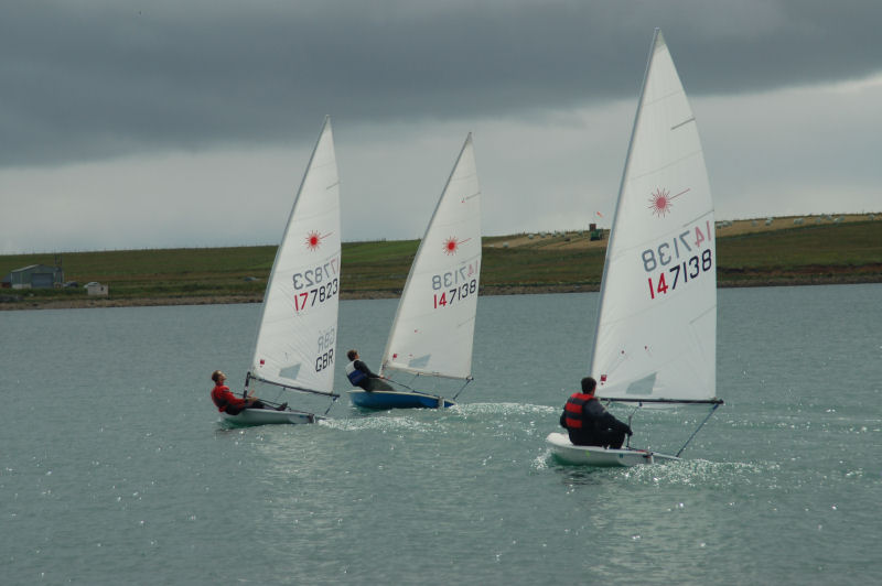 Racing during the Holm Yachts and Singlehanders Regatta photo copyright Andrew Leslie taken at Holm Sailing Club and featuring the ILCA 7 class