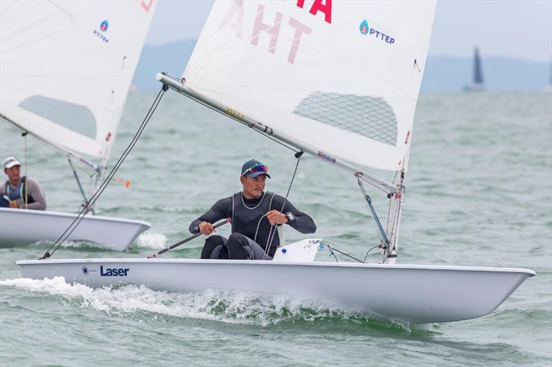 Keerati Bualong on his way to defending his title in Class 9a at Top of the Gulf Regatta photo copyright Guy Nowell taken at Ocean Marina Yacht Club and featuring the ILCA 7 class