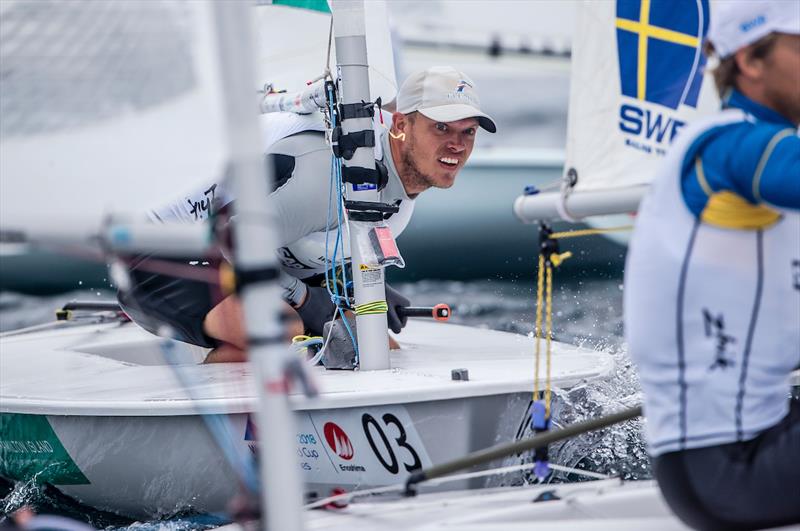 Tom Burton on Day 4 at World Cup Series Enoshima photo copyright Sailing Energy / World Sailing taken at  and featuring the ILCA 7 class