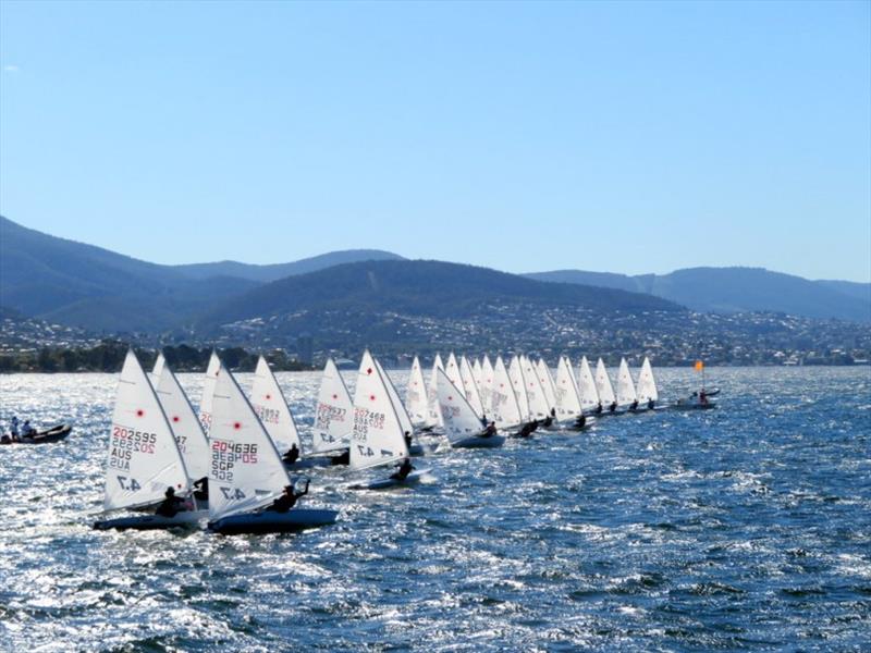 Laser fleet start on the Derwent - Day 2, Australian Sailing Youth Championships 2019 photo copyright Michelle Denney taken at Royal Yacht Club of Tasmania and featuring the ILCA 7 class