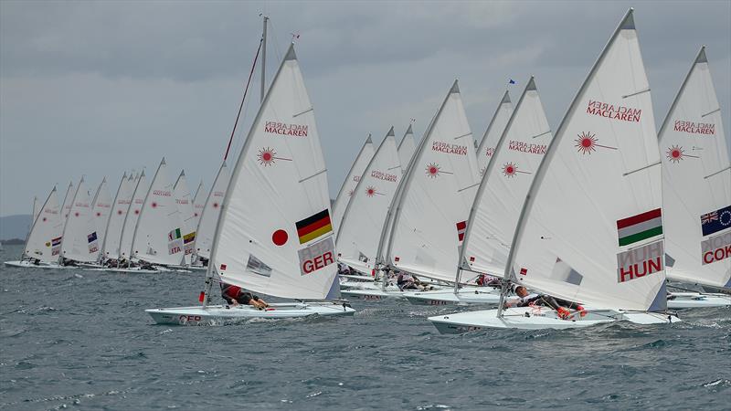 Almost 60 supplied Laser Radials cross the start line at the 2016 Youth Worlds, Torbay SC, December 2016 photo copyright Richard Gladwell taken at Torbay Sailing Club and featuring the ILCA 7 class