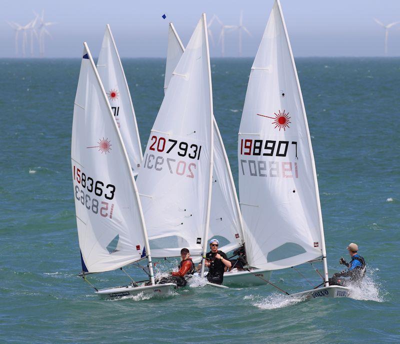 Chris Thomas, Stan Chick and Tom Goodey chat before a start in the Laserfest Tri-Series round 1 at Broadstairs photo copyright Nicky Whatley taken at Broadstairs Sailing Club and featuring the ILCA 7 class