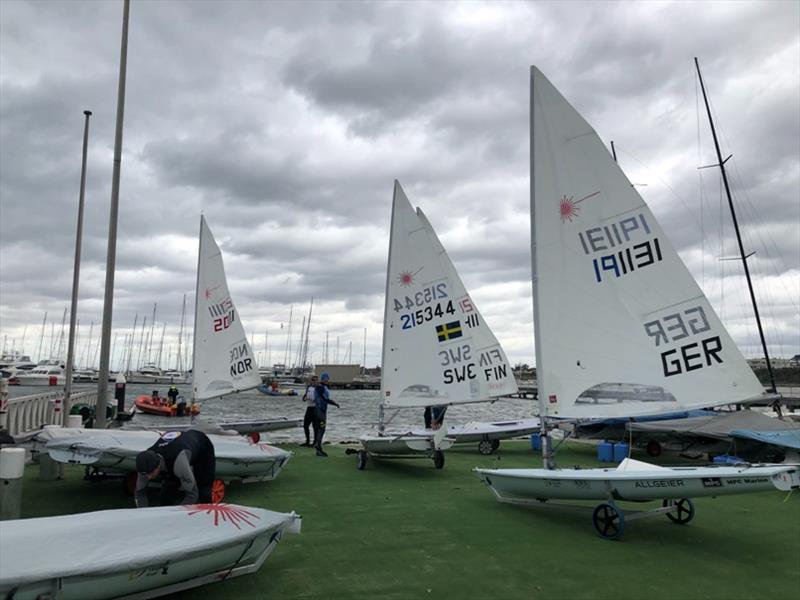 International co-operation – sailors from Germany, Finland, Sweden and Norway preparing to sail on a stormy day in Melbourne photo copyright James Sly / Laser 2020 taken at  and featuring the ILCA 7 class