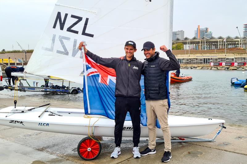 Tom Saunders celebrates with coach Mike Bullot - Laser/ILCA7 World Championship - Barcelona - November 2021 - photo © Yachting NZ