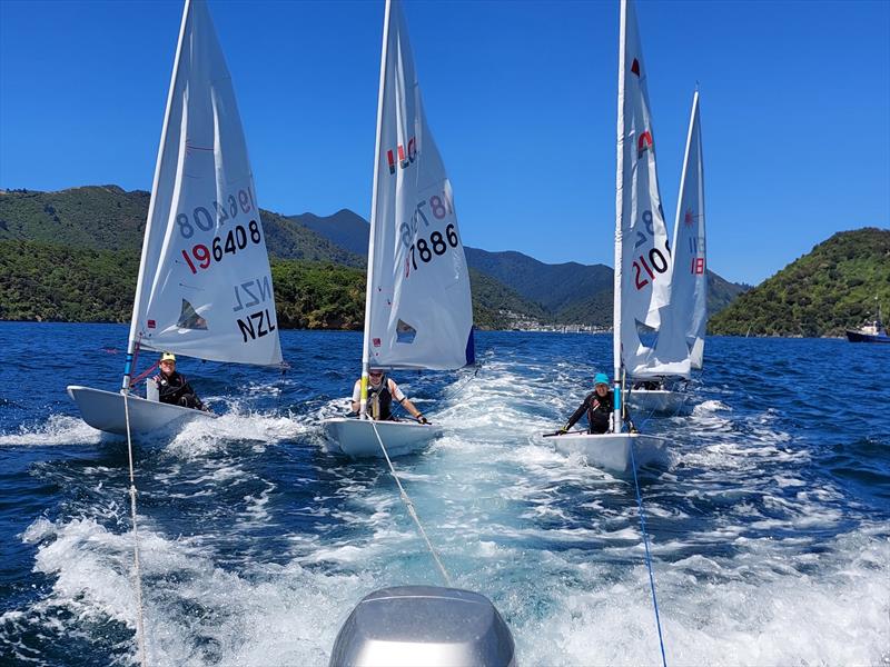 Tow out - 2022 ILCA Nationals - Queen Charlotte Yacht Club, Picton photo copyright Christel Hopkins taken at Queen Charlotte Yacht Club and featuring the ILCA 7 class