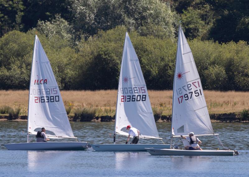 Goerge Fereday (middle), winner in the close racing on the first race during the Notts County ILCA Open - photo © David Eberlin