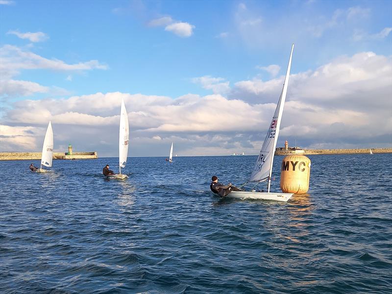 Gavan Murphy leads Conor O'Leary around the weather mark. Murphy comfortably leads the Dun Laoghaire Frostbite Series 1 ILCA 7s fleet overall photo copyright Ian Cutliffe taken at Dun Laoghaire Motor Yacht Club and featuring the ILCA 7 class