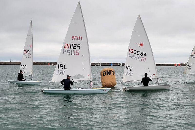 ILCA 7s  enjoy close company - Viking Marine DMYC Frostbite Series 2 day 3 photo copyright Ian Cutliffe taken at Dun Laoghaire Motor Yacht Club and featuring the ILCA 7 class