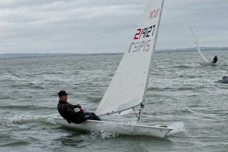 Dan O'Connell in the final race of the Howth YC Dinghy Frostbites Spring Series - photo © Neil Murphy