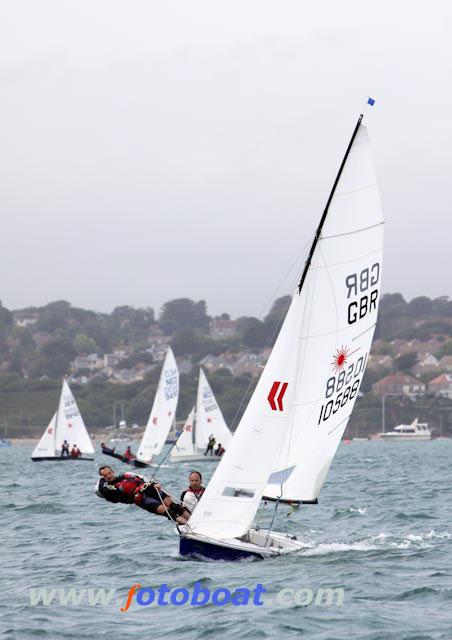 Another windy day at the Laser 2 worlds in Weymouth photo copyright Steve Bell / www.fotoboat.com taken at Weymouth & Portland Sailing Academy and featuring the Laser 2 class