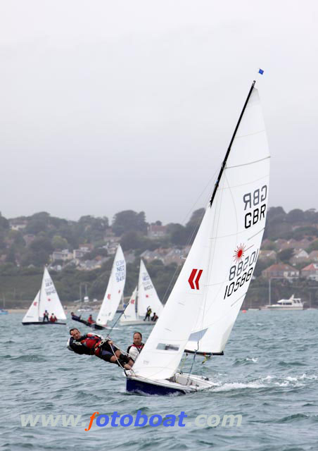 Another windy day at the Laser 2 worlds in Weymouth photo copyright Steve Bell / www.fotoboat.com taken at Weymouth & Portland Sailing Academy and featuring the Laser 2 class
