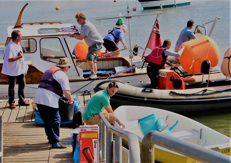 Race and safety teams getting set during the West Country Boat Repairs 2000 class Millennium Series at Keyhaven photo copyright Penny Moors taken at Keyhaven Yacht Club and featuring the 2000 class