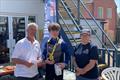 Whitstable YC RNLI Pursuit Race runner-up Ralph Hadley, with Commodore David Figgis and RNLI's Kellie Gray &copy; Steve Gray