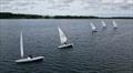 The fleet downwind during the Annual Women's ILCA Regatta at Burton Sailing Club  &copy; David Ellis