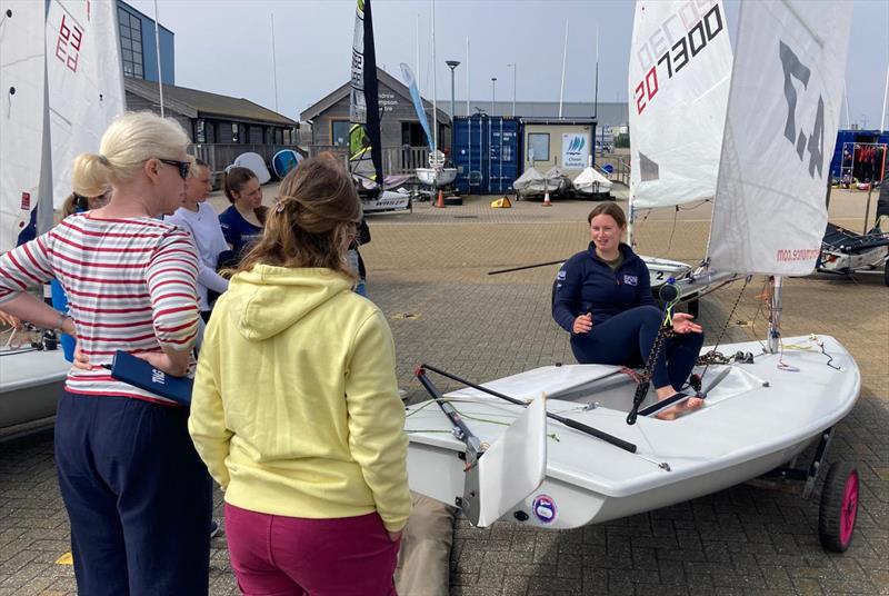 Molly Sacker explaining how to get more power - ILCA Women's Coaching Weekend at Weymouth photo copyright ILCA UK taken at Weymouth & Portland Sailing Academy and featuring the ILCA 4 class