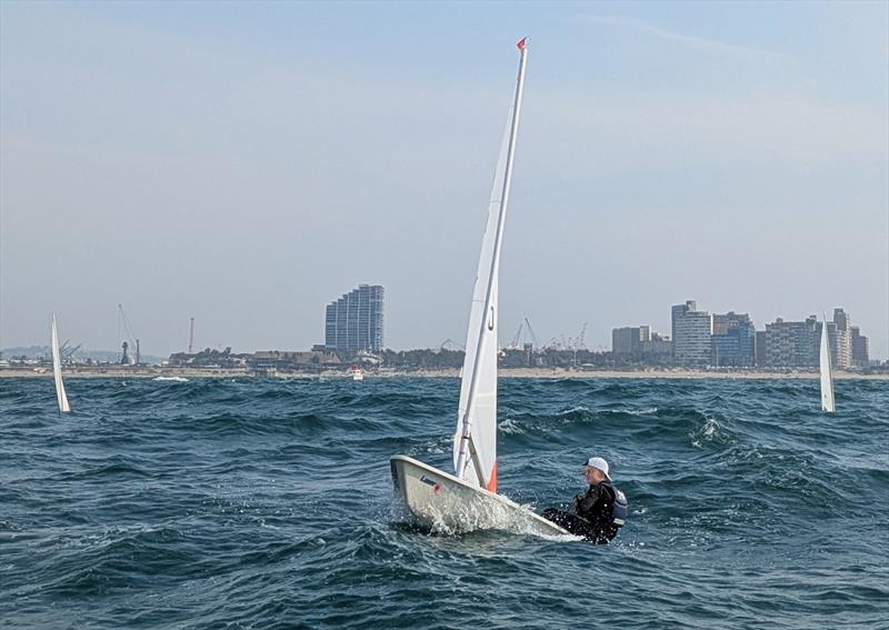 Life is all about balance. Joshua Keytel glides down the back of a swell as he heads down to the bottom mark during day one of the PYT ILCA KZN Regionals hosted offshore of Durban by Point Yacht Club - photo © Sophie Thompson