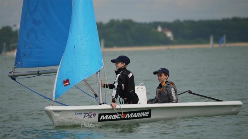 Haydn Sewell and Oliver Evans, unbeaten in the Slow Handicap fleet, win the Yachts and Yachting Trophy at Cowes Dinghy Week 2014 photo copyright Liz Harrison taken at Gurnard Sailing Club and featuring the Laser Pico class