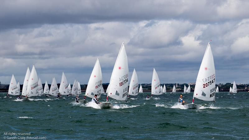 Stephan Kunath on day 4 of the KBC Laser Radial World Championships in Ireland photo copyright Gareth Craig / www.fotosail.com taken at Royal St George Yacht Club and featuring the ILCA 6 class